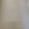 Plaster over a hole in the wall