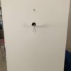 Plaster, patch, fill and sand old downlight holes.