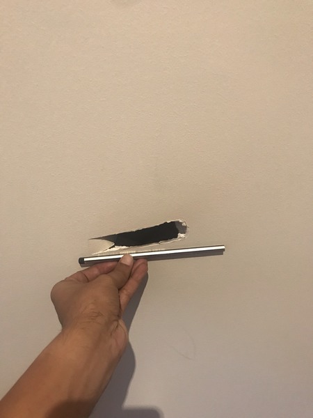 how to fix hole in wall