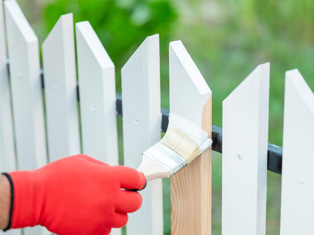 How to paint a fence without getting it on grass