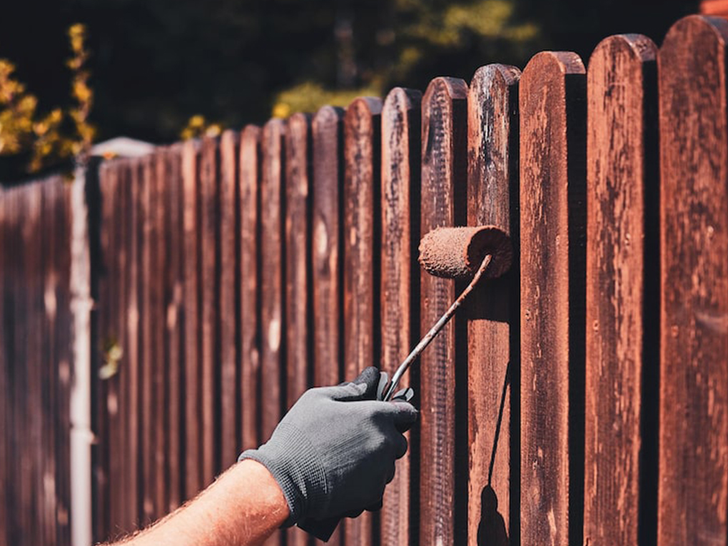 How to paint a fence without getting it on grass