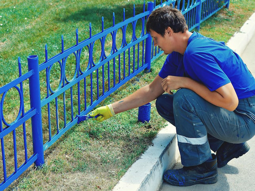 How to paint a fence without getting it on grass