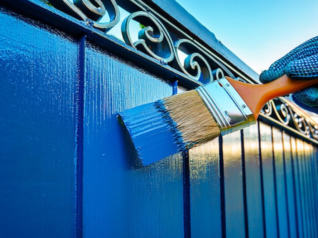 How to paint a fence without getting it on grass