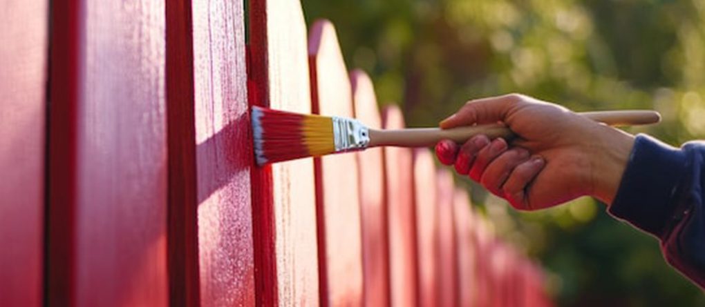 How to paint a fence without getting it on grass